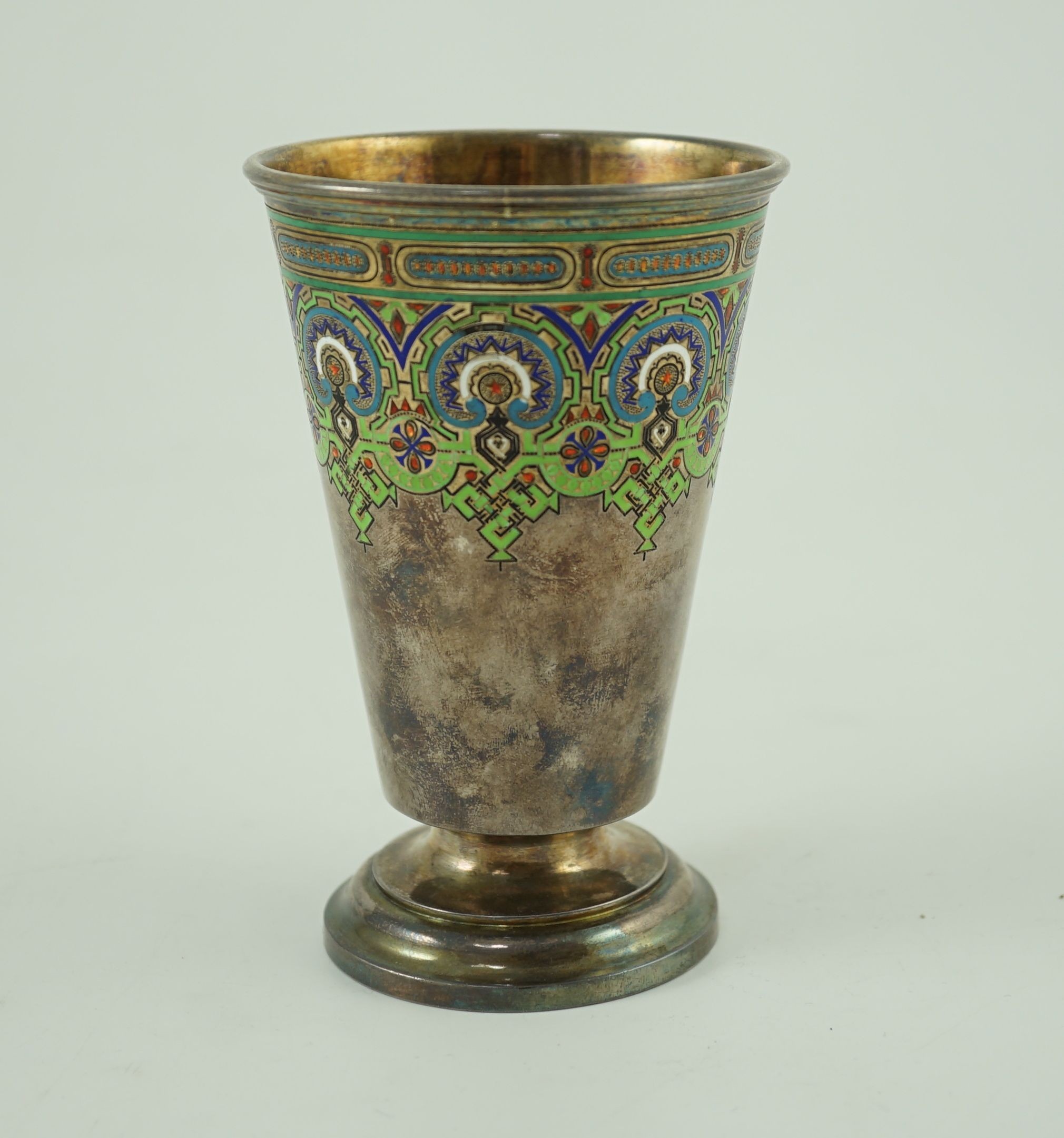 A late 19th century Russian 91 zolotnik silver and polychrome champlevé enamel pedestal beaker, St. Petersburg, maker Pavel Sazikov, 1874